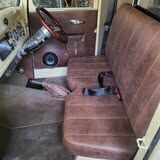 Re-trimmed automotive bench seat