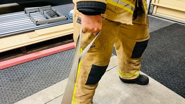 Stitching new webbing for the Whakatane Volunteer Fire Brigade