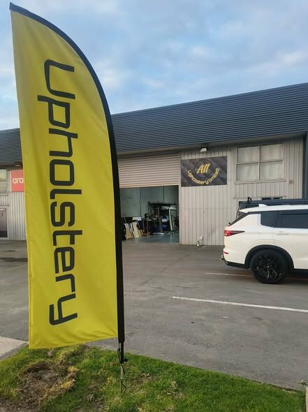 The All Upholstery Limited workshop in Whakatane with the yellow flag